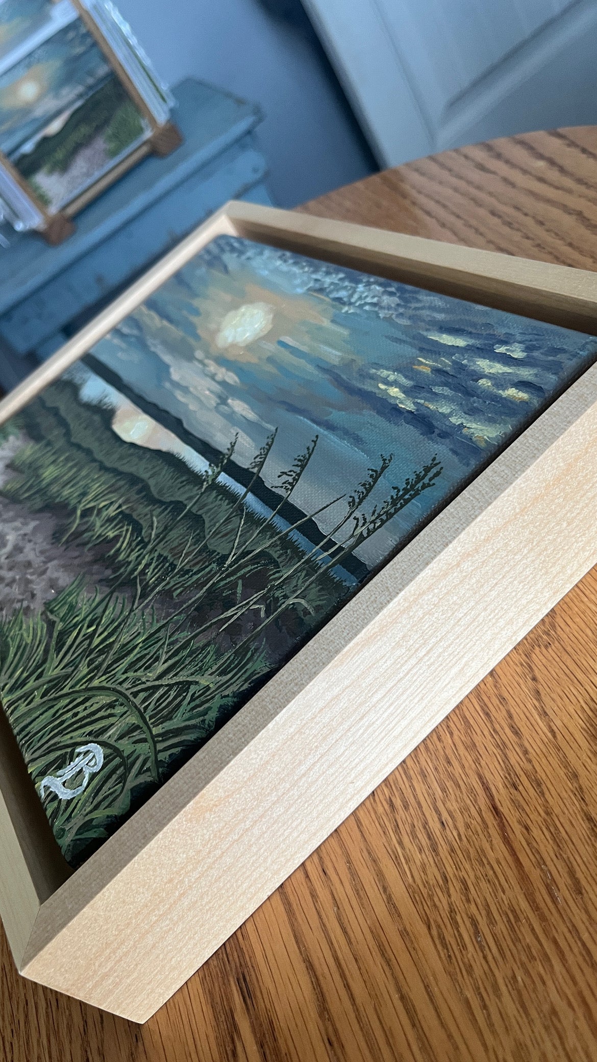 Original oil painting of the South End of Wrightsville Beach, NC, at sunset over the intercostal waterway and sand dunes with grasses.
