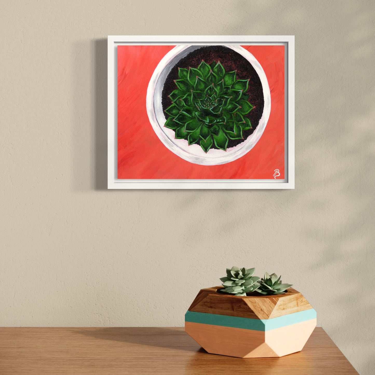 Original acrylic painting of a green succulent in a white pot with a coral pink background in a white float frame