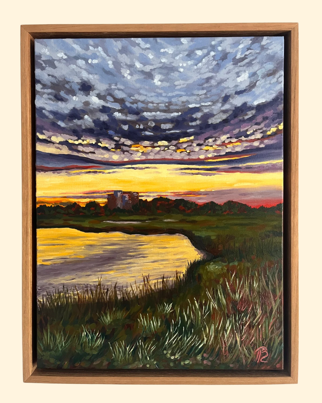 Painting of a sunset over the intracoastal waterway and marsh with building in distance.